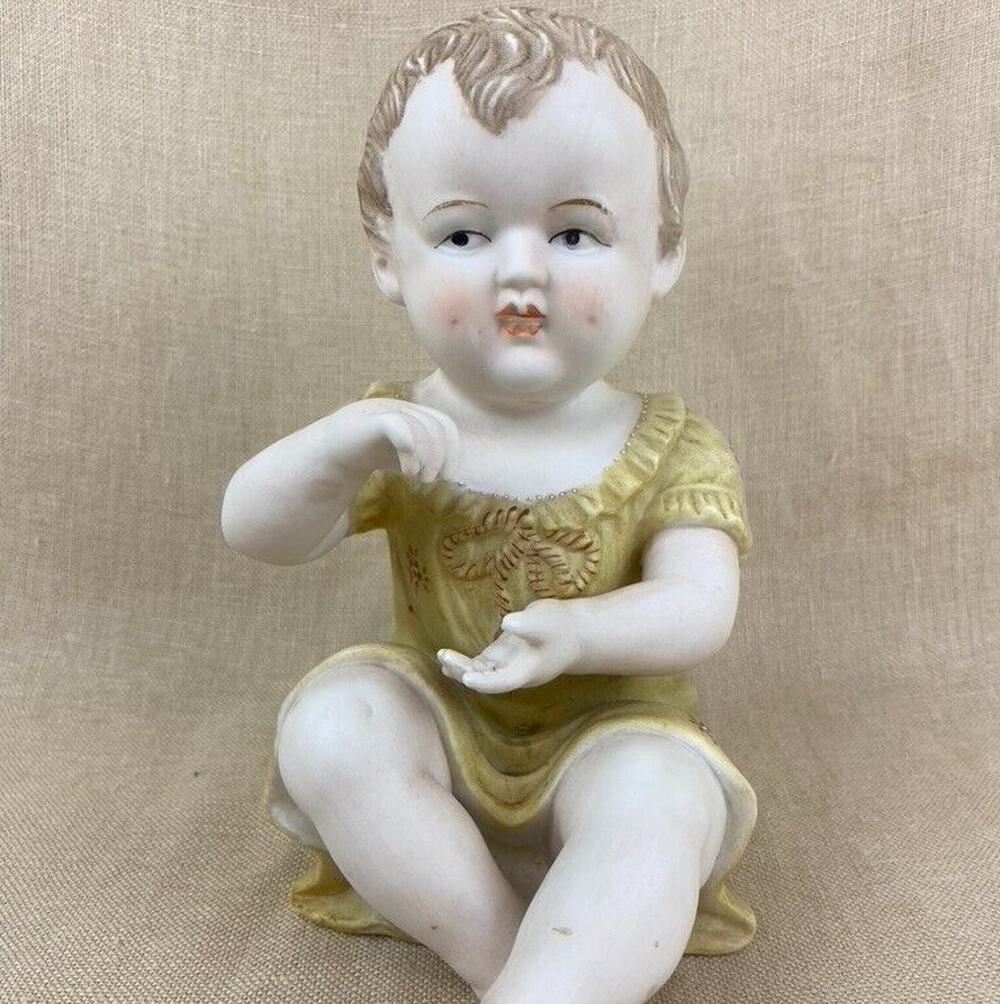 Vintage Bisque Porcelain Piano Baby Figurine 7”